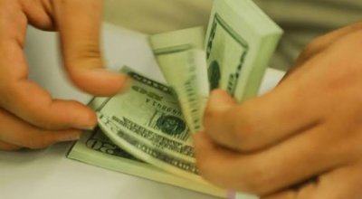 Dólar fica estável em R$ 5,08, mas cai 0,58% na semana